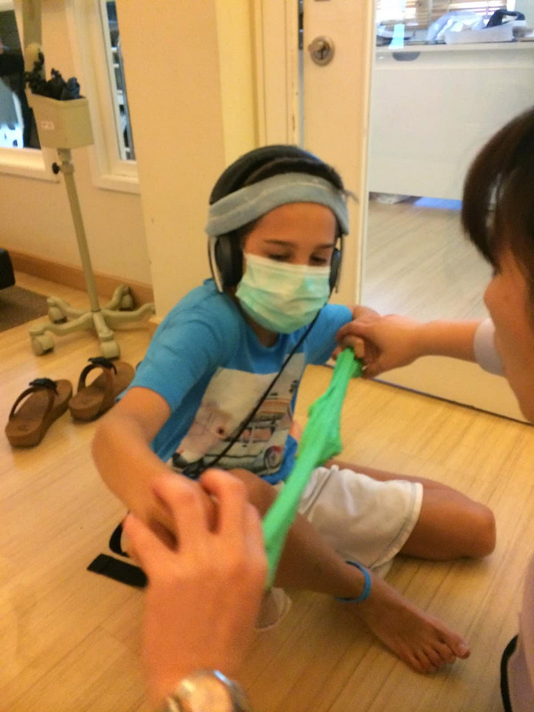 Flynn Rigby receiving physical therapy during his treatment for CP with Stem Cells